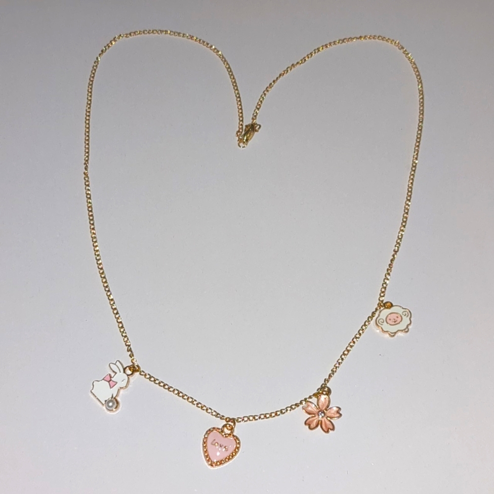 Gold Charm Necklace with Pink Accents